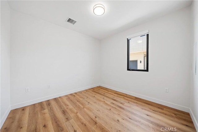 empty room featuring light hardwood / wood-style flooring