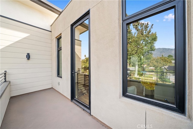 balcony featuring a mountain view