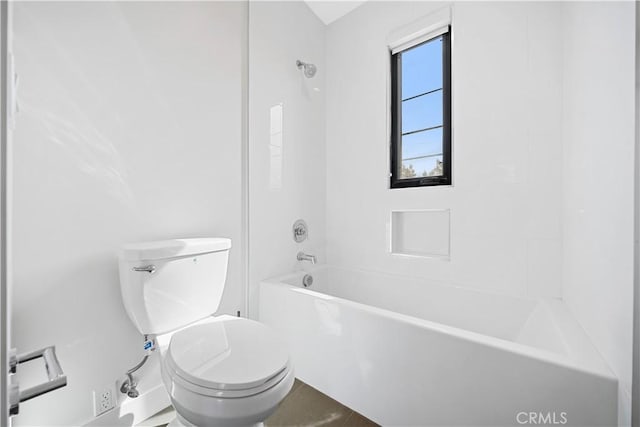 bathroom featuring toilet and shower / washtub combination