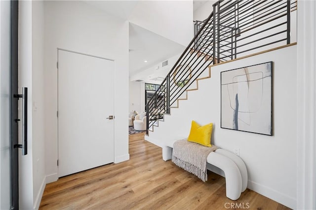 entrance foyer featuring hardwood / wood-style floors