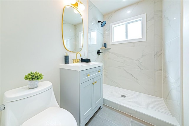 2942 S W View St, Los Angeles, CA 90016 - full bathroom featuring toilet, vanity, a marble finish shower, and tile patterned floors