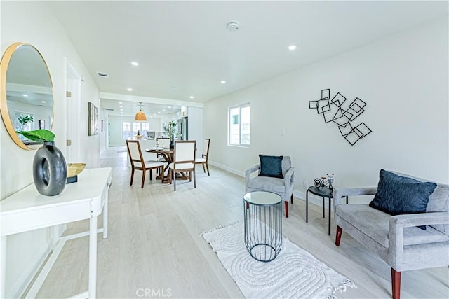 2942 S W View St, Los Angeles, CA 90016 - living room featuring light wood-type flooring, recessed lighting, and baseboards