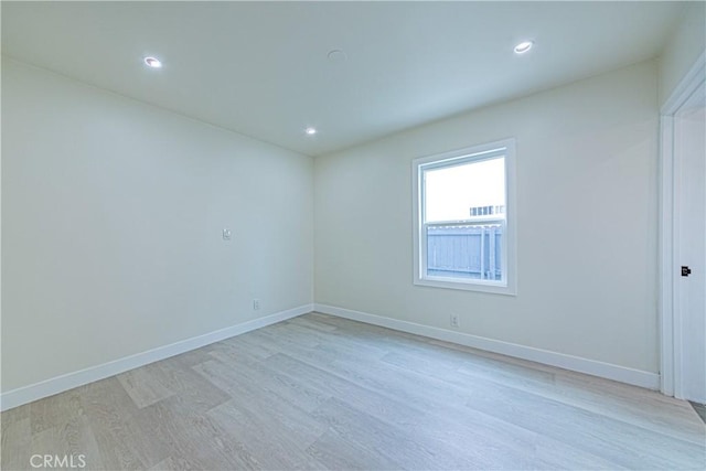 2942 S W View St, Los Angeles, CA 90016 - spare room with light wood-style flooring, baseboards, and recessed lighting