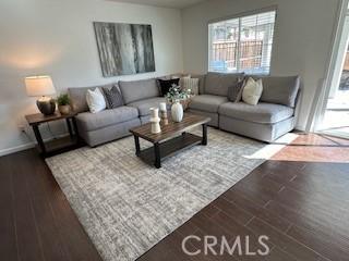 living room with wood-type flooring