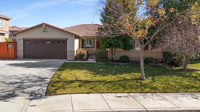 view of front of house with a garage and a front lawn