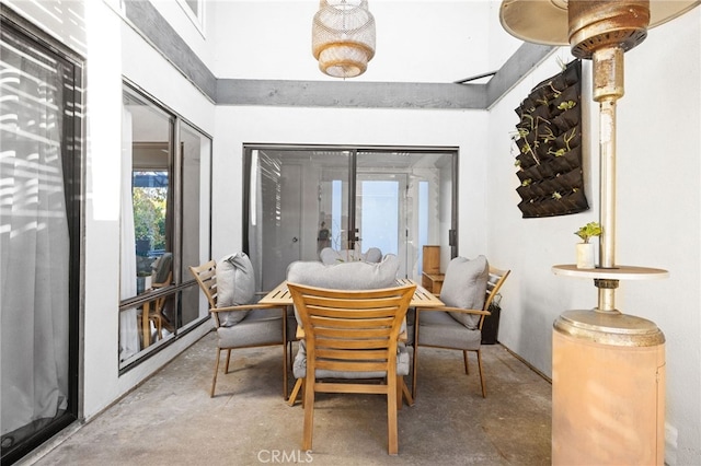 dining room featuring concrete floors