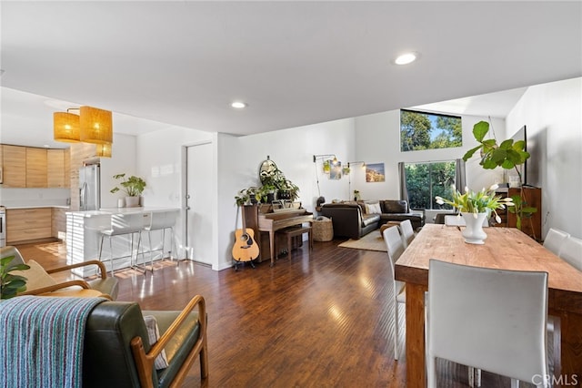 dining area featuring dark hardwood / wood-style floors