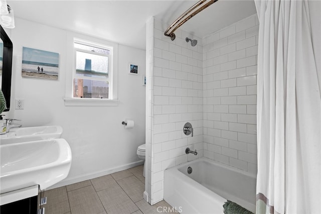 full bathroom featuring sink, shower / bathtub combination with curtain, and toilet