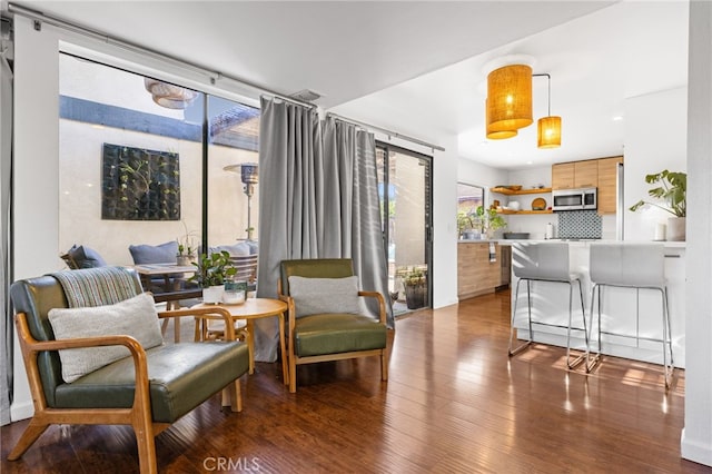 living area featuring hardwood / wood-style flooring