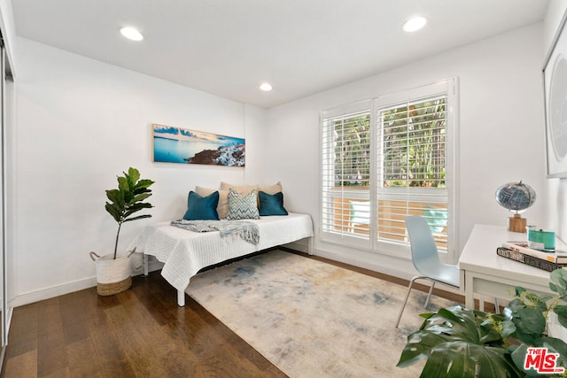 living area featuring dark hardwood / wood-style floors