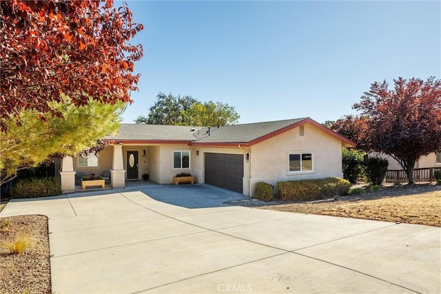 single story home featuring a garage