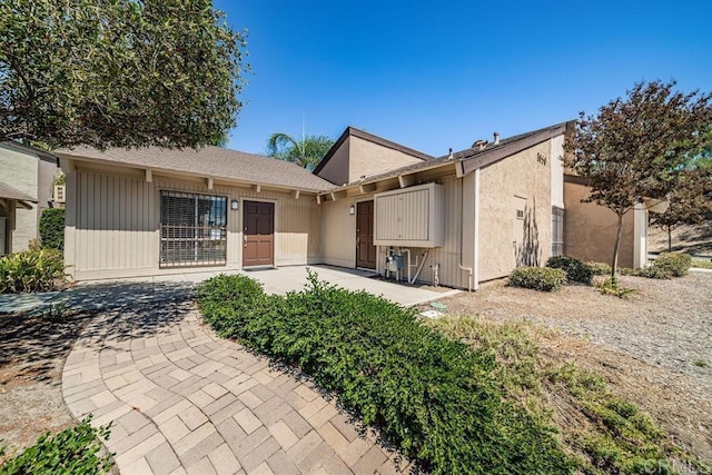 view of front of home with a patio