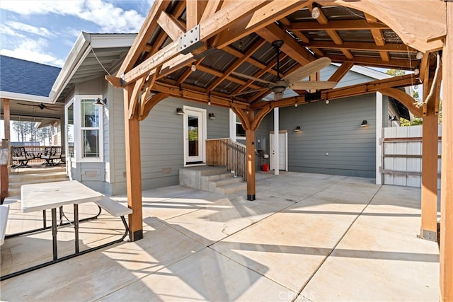 view of patio / terrace featuring a gazebo and ceiling fan