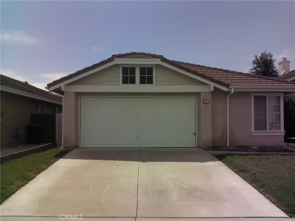 ranch-style house with a garage