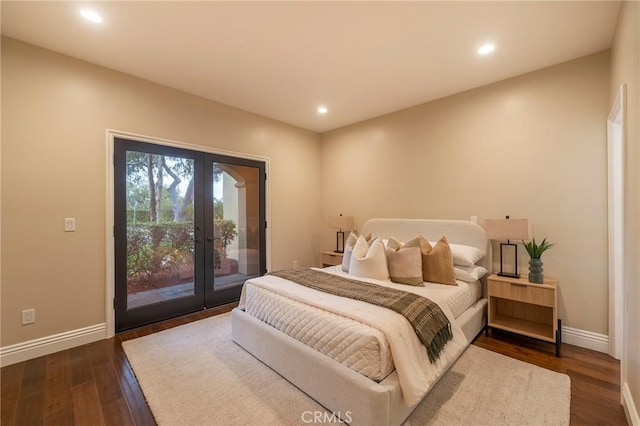 bedroom featuring access to exterior, dark hardwood / wood-style flooring, and french doors