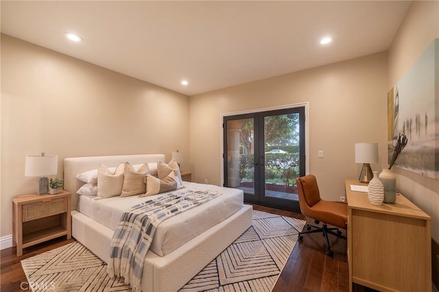 bedroom with access to outside, dark hardwood / wood-style flooring, and french doors