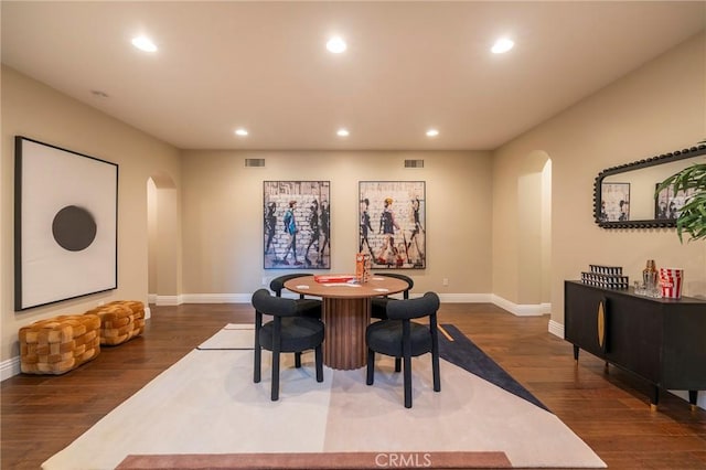 dining room featuring dark hardwood / wood-style flooring