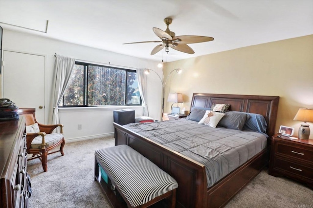 bedroom featuring ceiling fan and light colored carpet