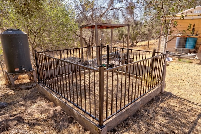 view of gate with a wooden deck and central AC unit