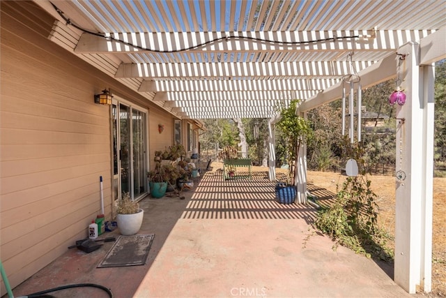 view of patio / terrace featuring a pergola