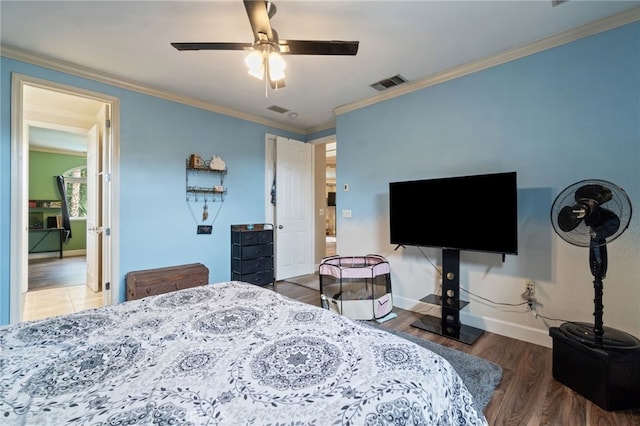 2550 E Jenny Ave, Fresno, CA 93720 - bedroom featuring ceiling fan, dark hardwood / wood-style flooring, and crown molding
