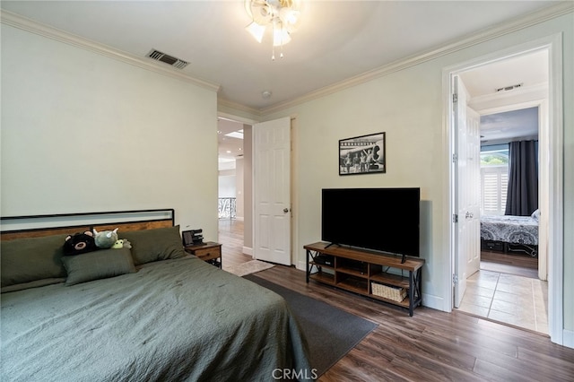 2550 E Jenny Ave, Fresno, CA 93720 - bedroom with ceiling fan, wood-type flooring, and ornamental molding