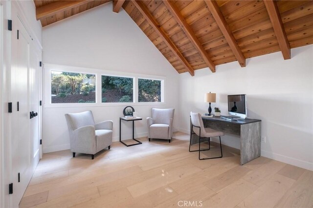 office space with beamed ceiling, light hardwood / wood-style floors, high vaulted ceiling, and wooden ceiling