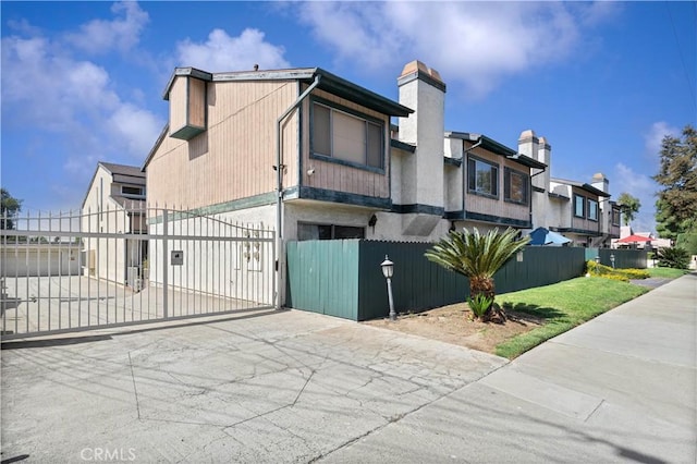 view of side of home with a garage