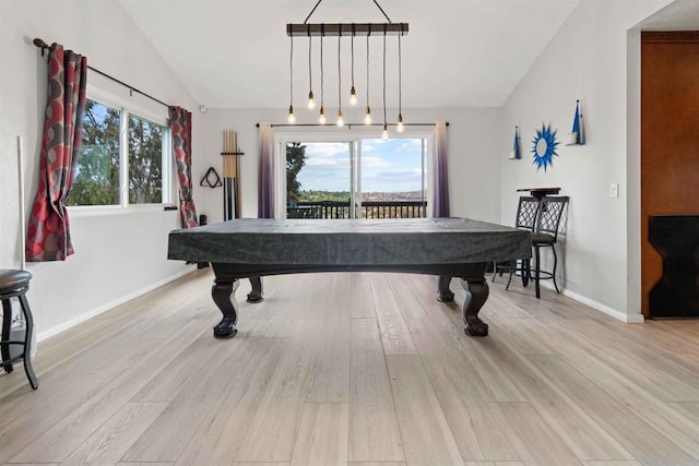 recreation room with a wealth of natural light, pool table, vaulted ceiling, and light wood-type flooring