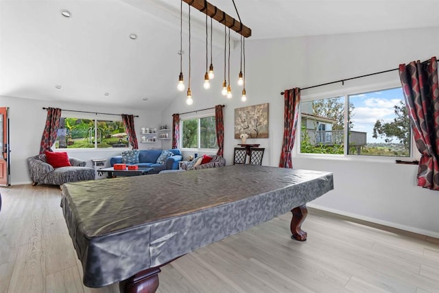 game room featuring pool table, vaulted ceiling with beams, light wood-type flooring, and a wealth of natural light