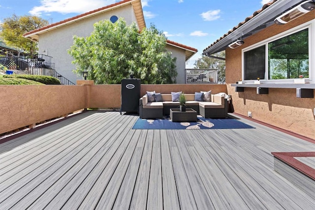 deck with an outdoor living space