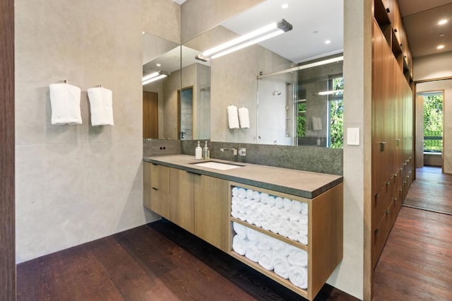 bathroom featuring wood-type flooring and vanity