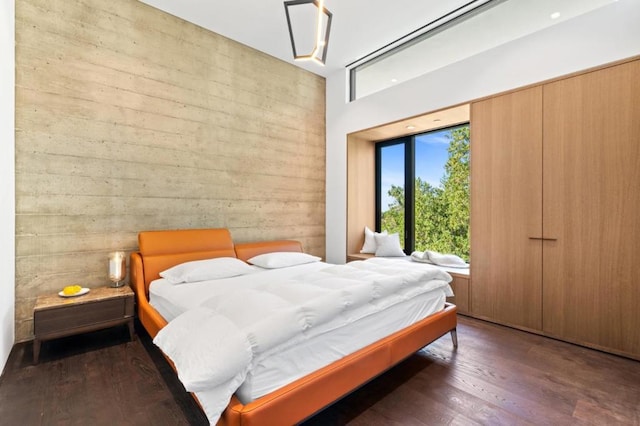 bedroom featuring dark wood-type flooring