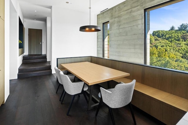 dining room with dark wood-type flooring and breakfast area