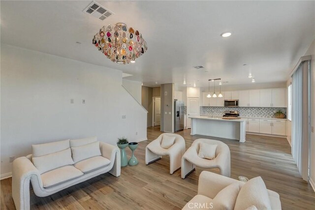 living room with light wood-type flooring