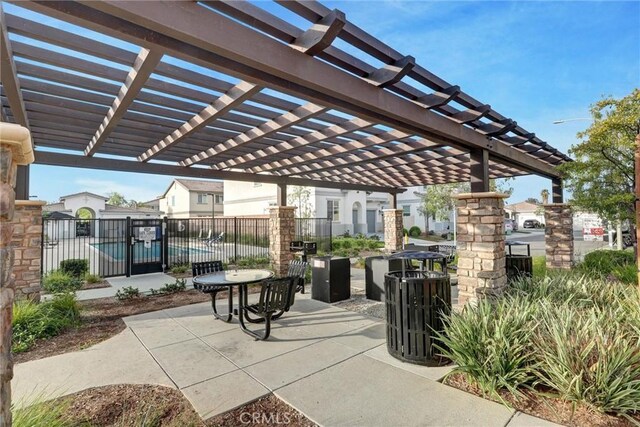 view of patio featuring a pergola