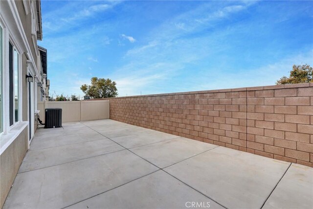 view of patio with central AC unit