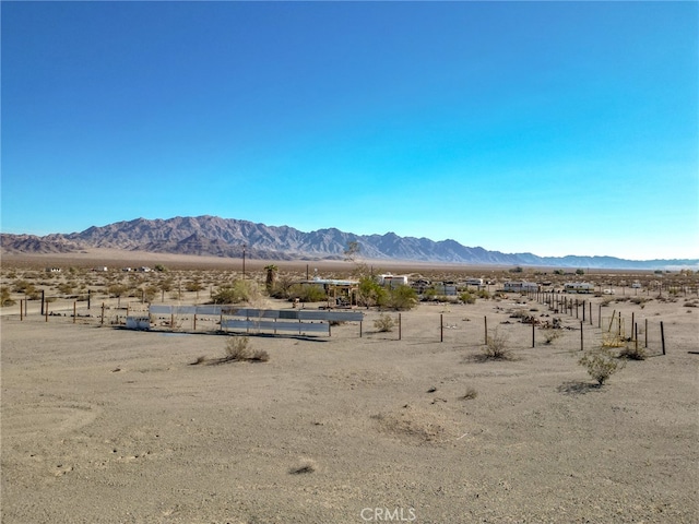 property view of mountains featuring a rural view