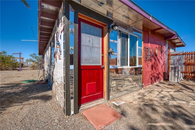 doorway to property with central AC