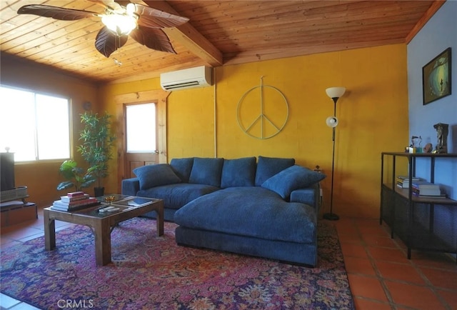 living room featuring a wall unit AC, ceiling fan, dark tile patterned floors, wooden ceiling, and beamed ceiling