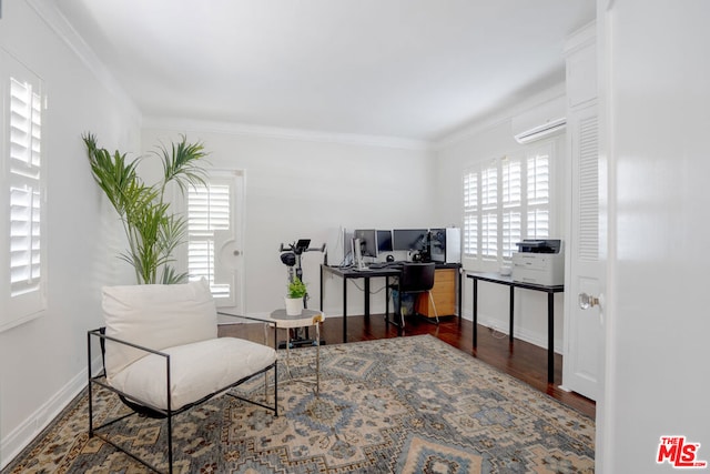 office space featuring dark hardwood / wood-style flooring, crown molding, and a wall mounted AC