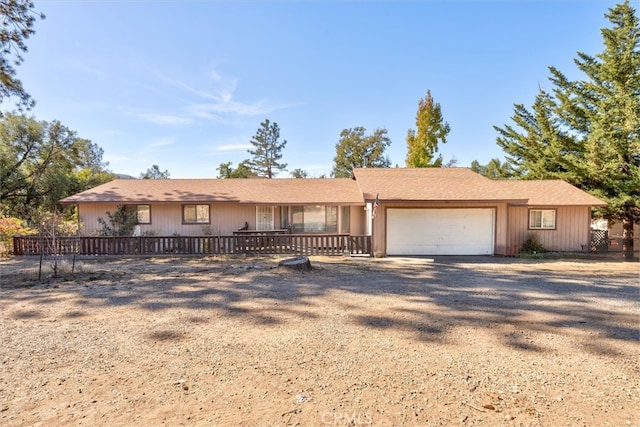 single story home featuring a garage