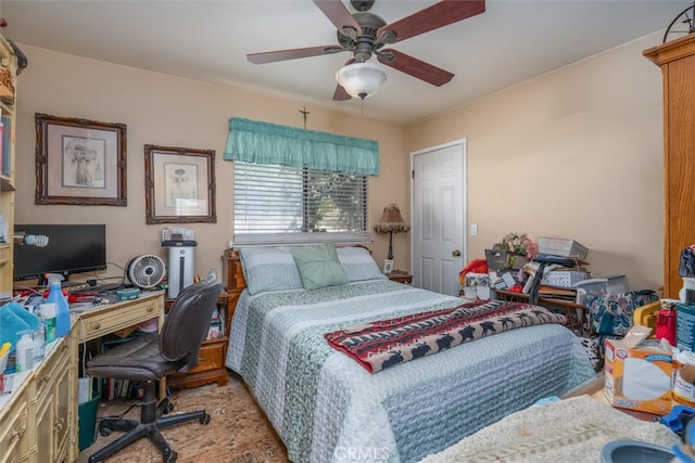 bedroom featuring ceiling fan