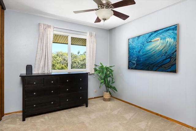 bedroom featuring ceiling fan and light colored carpet