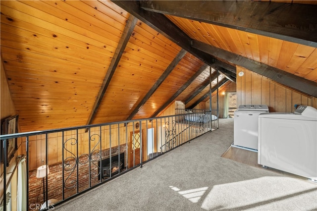 bonus room with wood walls, wooden ceiling, carpet floors, and lofted ceiling with beams