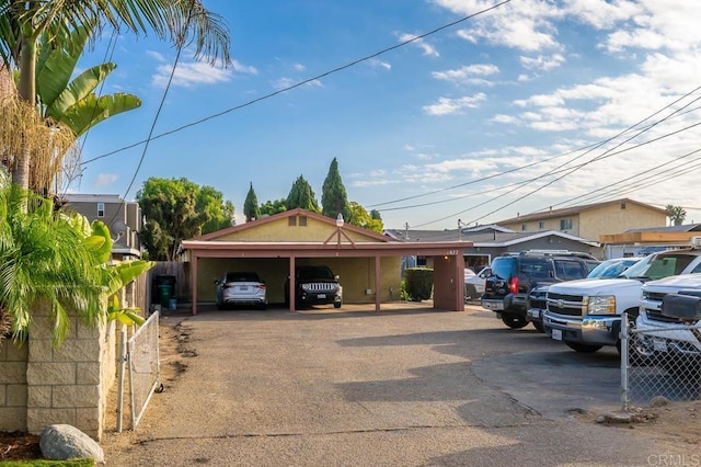 view of front of home featuring a carport