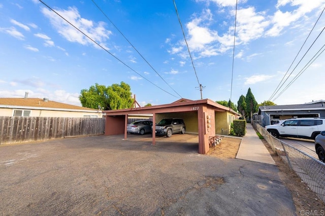 exterior space featuring a carport