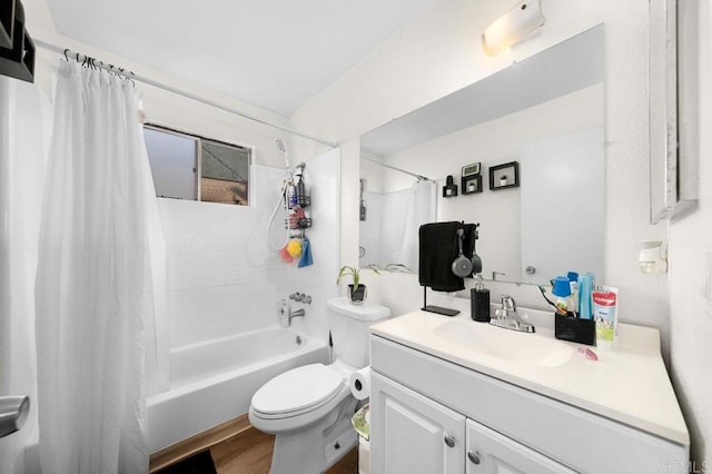 full bathroom featuring hardwood / wood-style flooring, toilet, shower / bathtub combination with curtain, and vanity