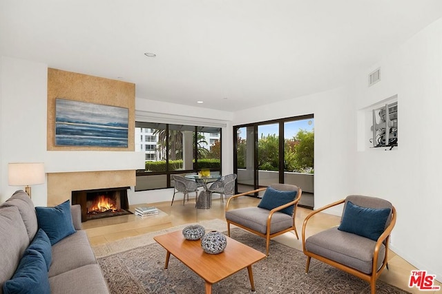 tiled living room with a fireplace