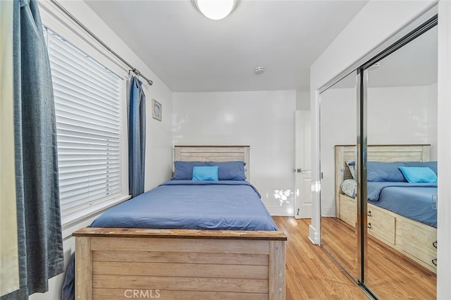 bedroom with wood-type flooring